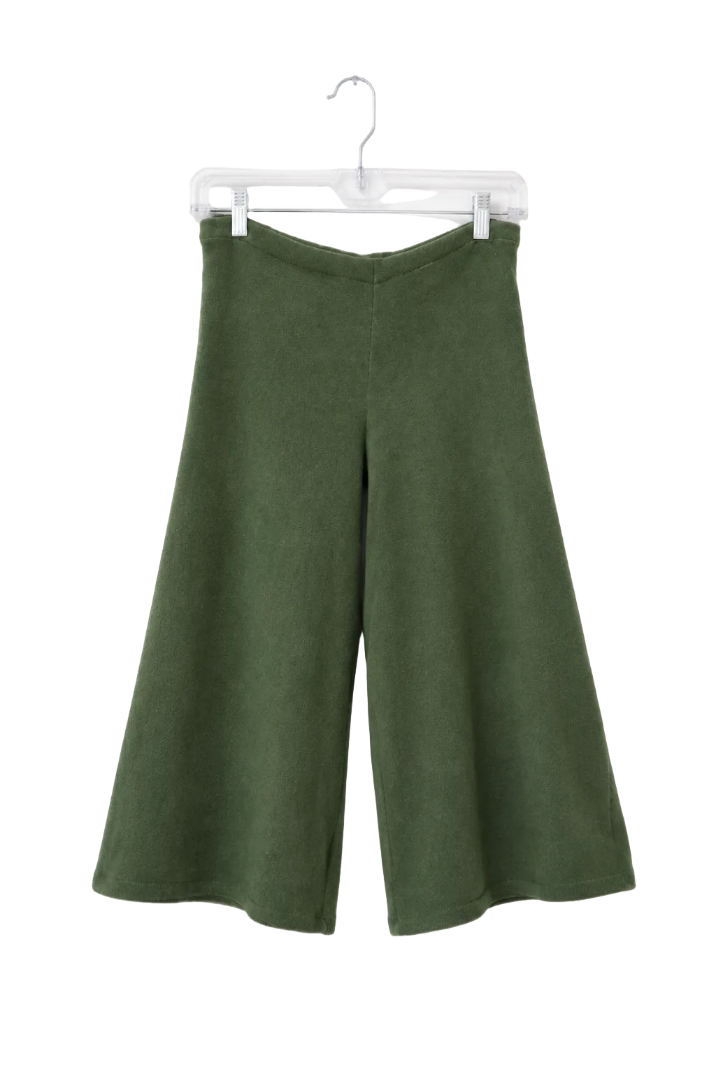 A pair of olive green wide-leg cropped pants hanging from a clear plastic hanger against a plain white wall.