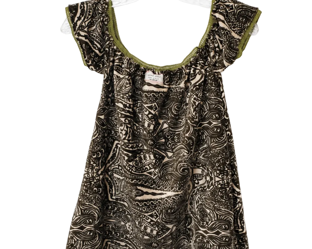 A short-sleeve babydoll dress with an abstract black and beige pattern, featuring olive green trim along the scoop neckline, hanging on a clear plastic hanger against a white background.