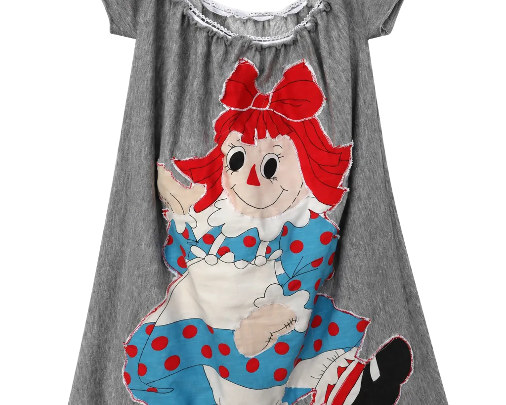 A gray short-sleeve babydoll nightgown featuring a large applique of a Raggedy Ann red-haired clown character with a red bow, blue polka-dot outfit, and black-and-white shoes.