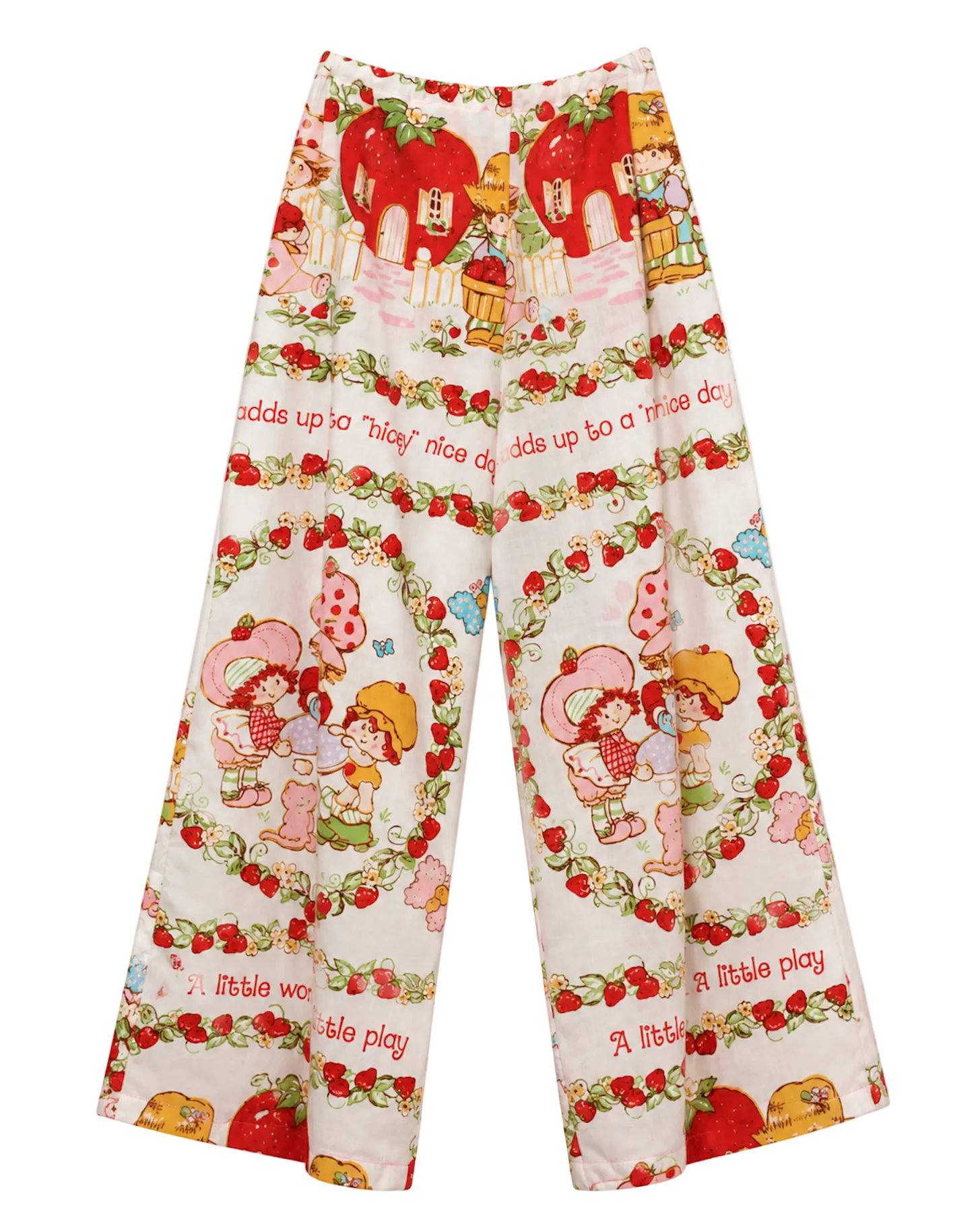 A pair of 1983 wide-leg cropped pants featuring a colorful Strawberry Shortcake-themed print with red strawberries, cartoon characters, and text on a cream background.