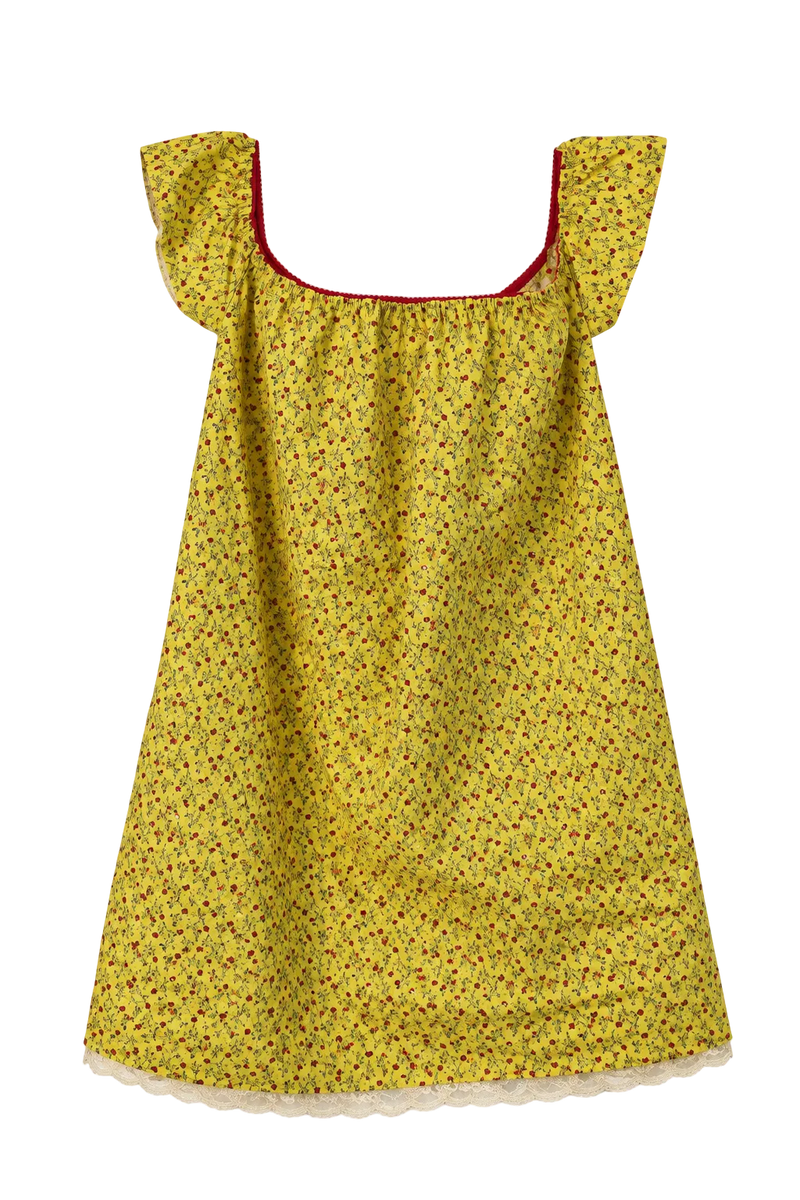 A yellow off-the-shoulder dress with a small red and green floral pattern, featuring a red inner trim and a white lace hem, shown against a plain white background.