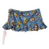 The Rag Doll Ruffle Mini - back view showing ruffled hem and clean print
